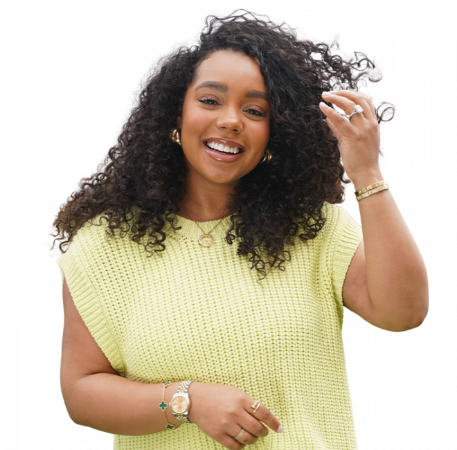 A woman smiling and posing for a picture