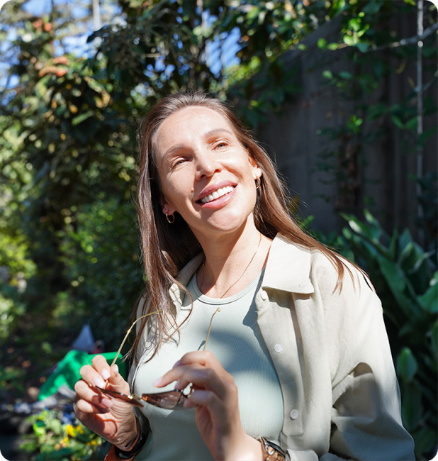 Woman staring away and smiling